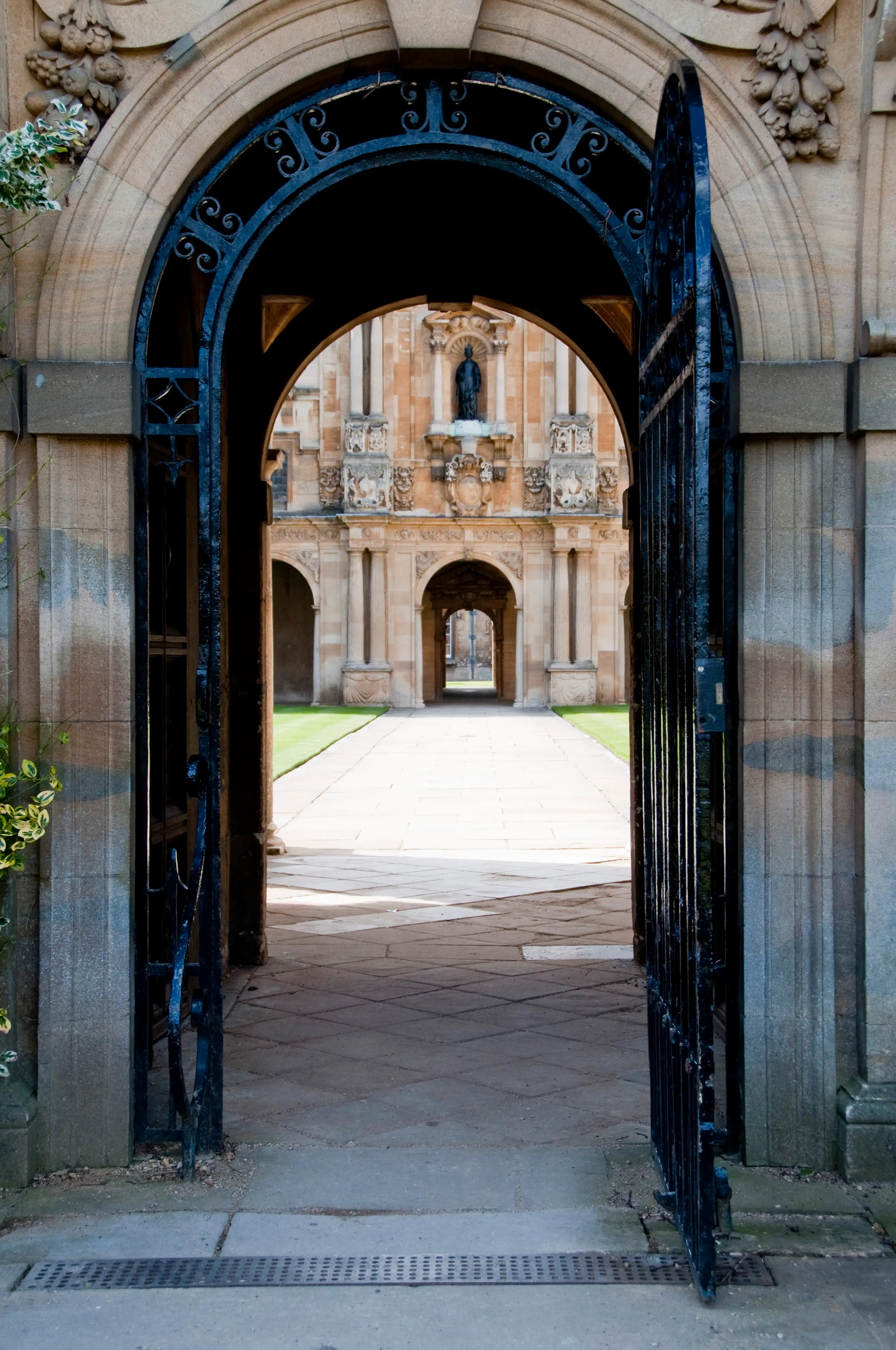 Looking through the college archway towards the lawn and garden beyond.